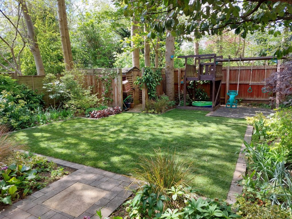 Ali's gardening business franchise well maintained lawn
